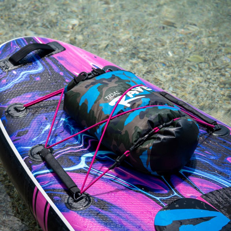a paddle board with a water proof dry bag